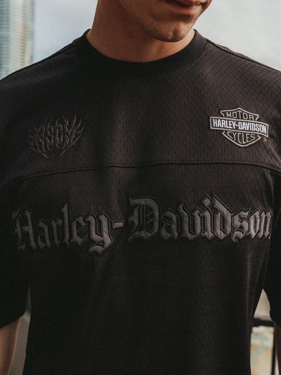 Black Harley-Davidson t-shirt with brand logo on a blurred background
